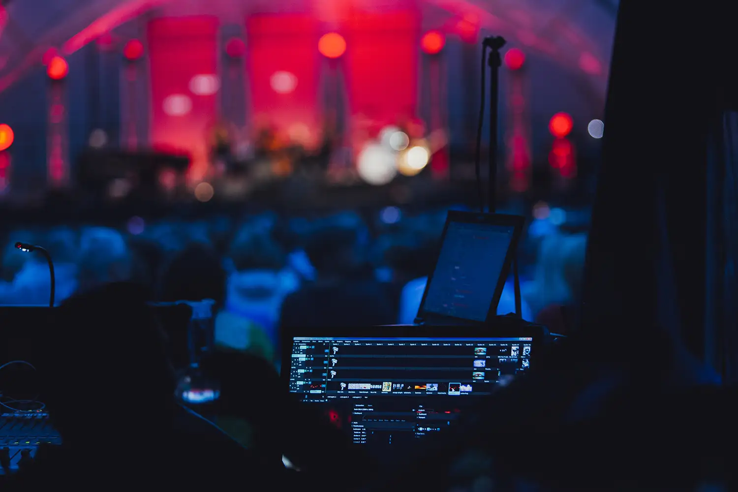 A photo of an evening event or musical show being streamed on the internet by a team of video production professionals near San Francisco